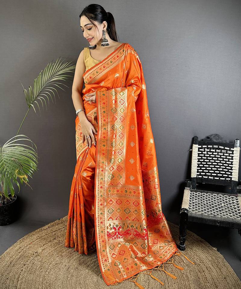 orange soft silk blend geomatric zari woven patola saree