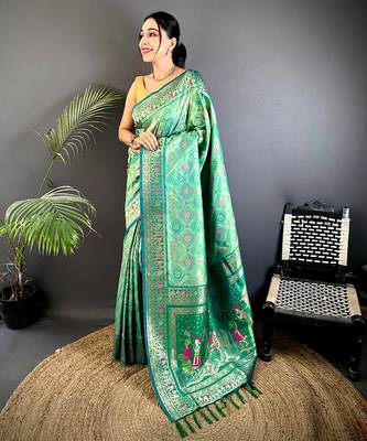 bottle green soft silk blend zari butti motifs patola saree 1