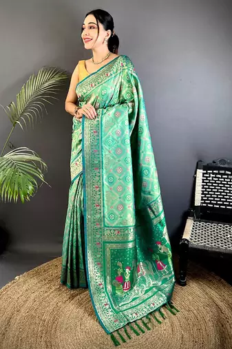 bottle green soft silk blend zari butti motifs patola saree