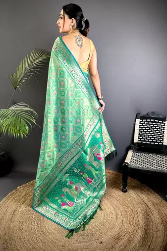 bottle green soft silk blend zari butti motifs patola saree