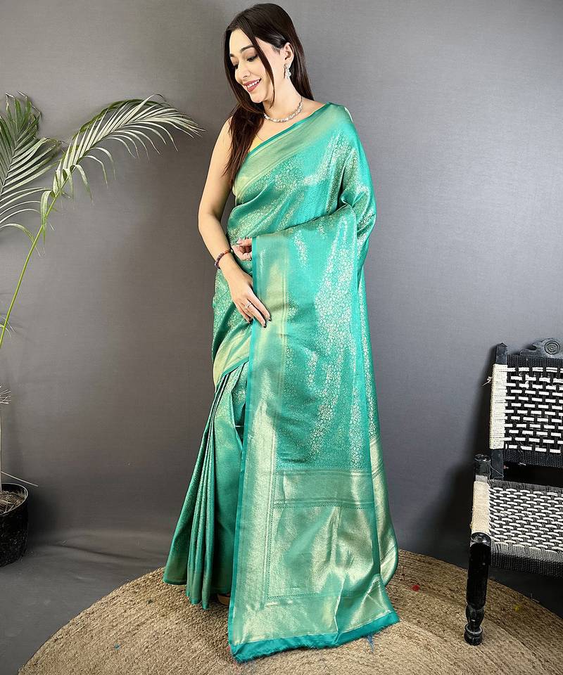 teal satin silk blend floral motifs & ethnic silver zari design kanchipuram saree