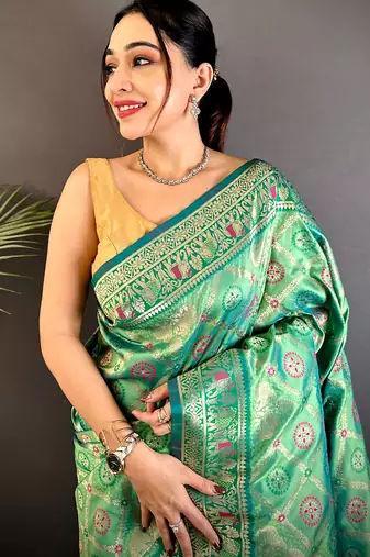 bottle green soft silk blend zari butti motifs patola saree