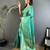 teal satin silk blend floral motifs & ethnic silver zari design kanchipuram saree