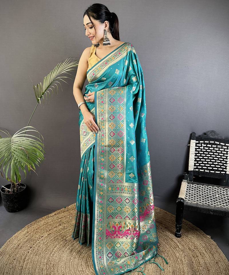turquoise blue soft silk blend geomatric zari woven patola saree