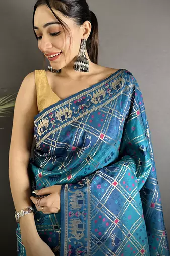 blue soft silk blend geomatric zari woven patola saree