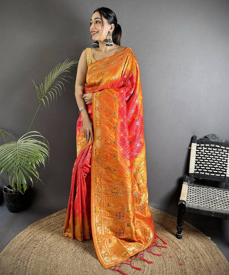 pastel orange soft silk blend geomatric zari woven patola saree