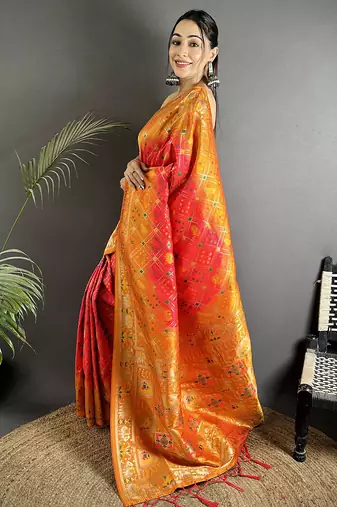 pastel orange soft silk blend geomatric zari woven patola saree
