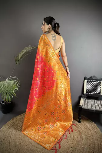 pastel orange soft silk blend geomatric zari woven patola saree