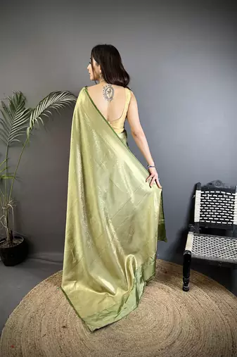 sage green satin silk blend floral motifs & ethnic silver zari design kanchipuram saree