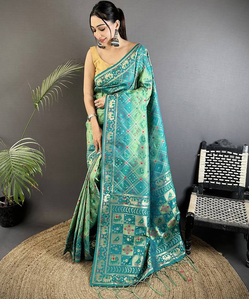 tuquoise soft silk blend geomatric zari woven patola saree