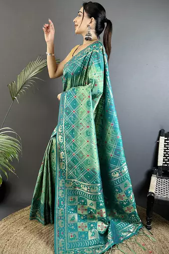 tuquoise soft silk blend geomatric zari woven patola saree