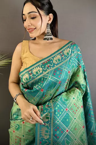 tuquoise soft silk blend geomatric zari woven patola saree