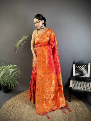 orange soft silk blend geomatric zari woven patola saree 1