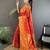orange soft silk blend geomatric zari woven patola saree