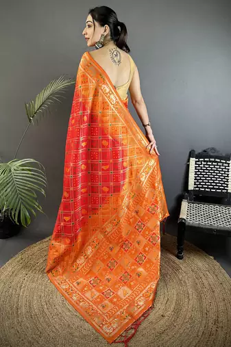 orange soft silk blend geomatric zari woven patola saree