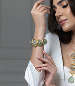 Gold plated kundan green stones bracelet