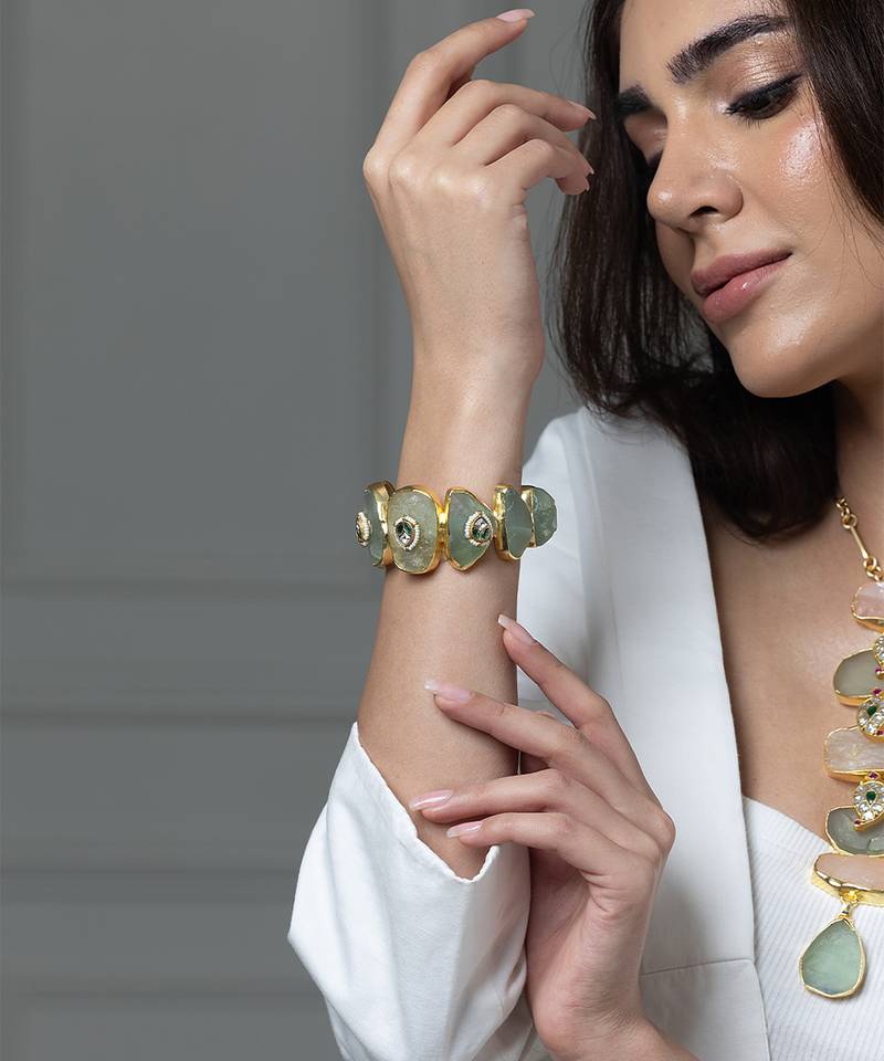 Gold plated kundan green stones bracelet