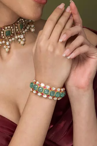 Gold plated kundan Green stones bangles