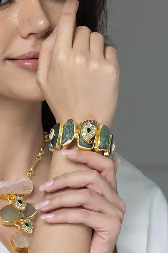 Gold plated kundan green stones bracelet