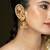 Gold plated kundan jhumka earrings