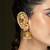 Gold plated kundan jhumka earrings