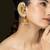 Gold plated kundan jhumka earrings