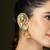 Gold plated kundan green stones jhumka earrings