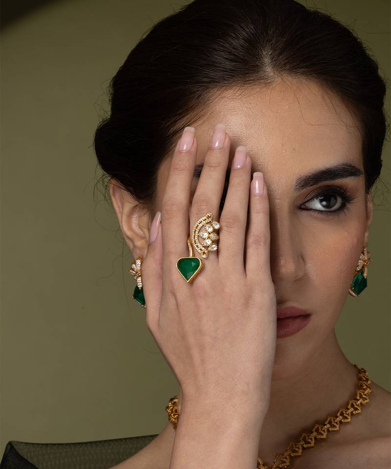 Gold plated kundan green stones ring