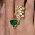 Gold plated kundan green stones ring