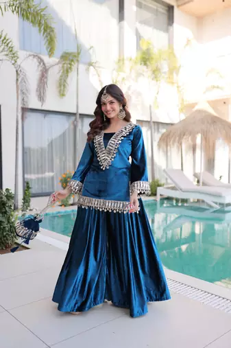 Rama Embroidered velvet salwar suit