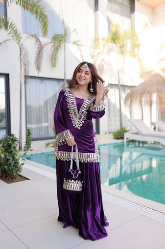 Purple Embroidered velvet salwar suit