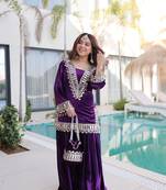 Purple Embroidered velvet salwar suit