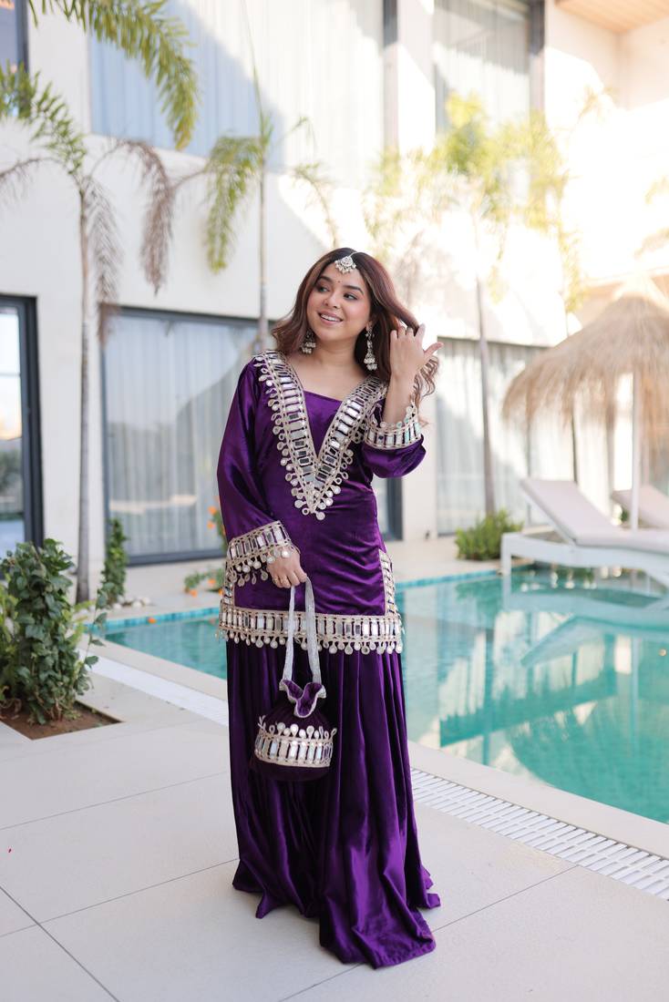 Purple Embroidered velvet salwar suit