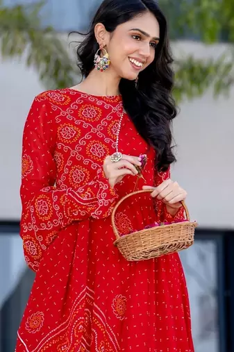 red bandhani print lace work anarkali with pant and dupatta set