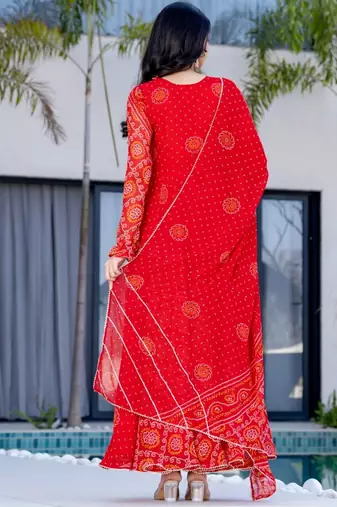 red bandhani print lace work anarkali with pant and dupatta set