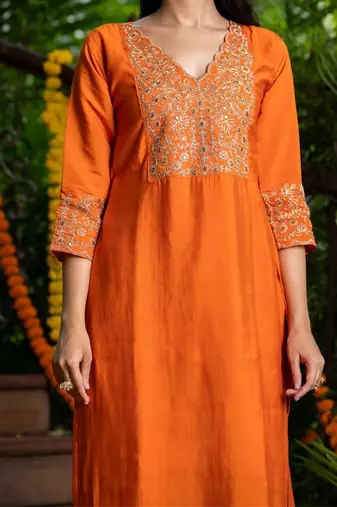 Orange silk embroidered kurta and pant and dupatta