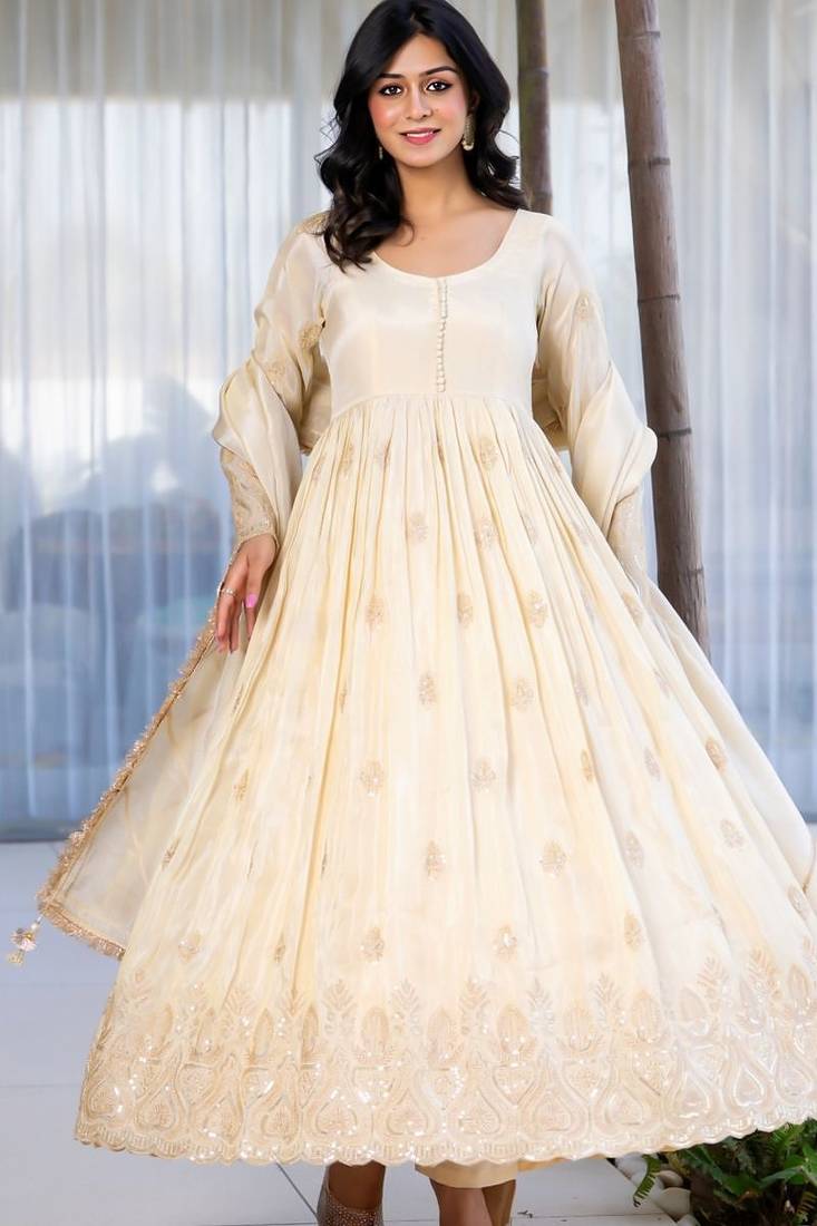 Off white anarkali with gloden emboridered tissue anarkali and pant and dupatta