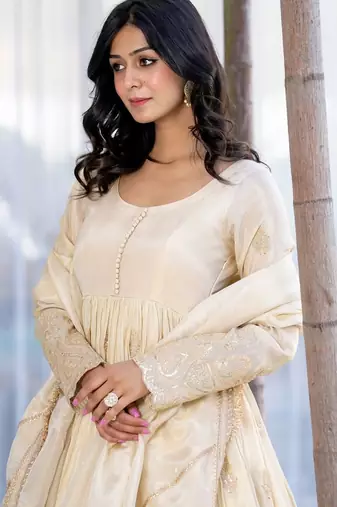 Off white anarkali with gloden emboridered tissue anarkali and pant and dupatta