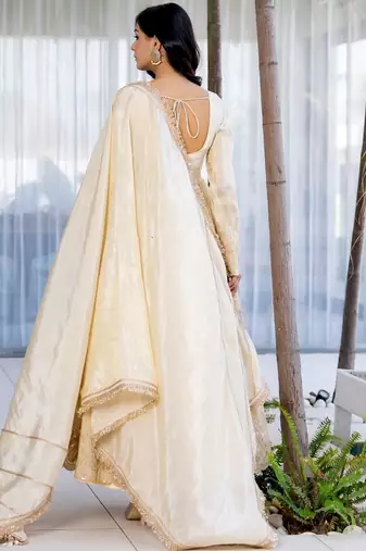 Off white anarkali with gloden emboridered tissue anarkali and pant and dupatta