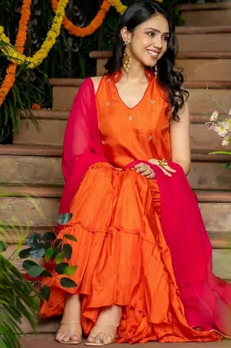 orange uppada silk kurta with sharara and pink dupatta
