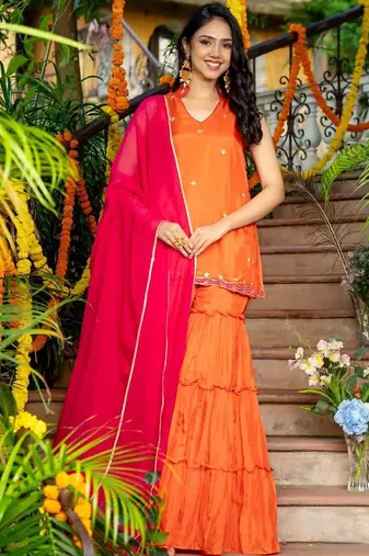 orange uppada silk kurta with sharara and pink dupatta