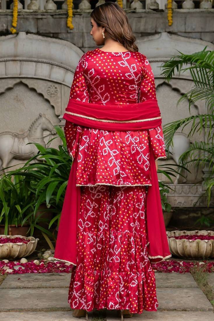 Maroon chinnon bandhej printed kurta and sharara and dupatta