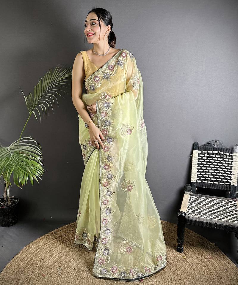 yellow   organza silk blend pale prim yellow dubble sequence saree with unstitched blouse
