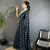 blue georgette saree   deep blue polka dot pattern saree with unstitched blouse