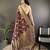 brown banarasi soft lichi silk blend brown floral and zari pattern saree with unstitched blouse