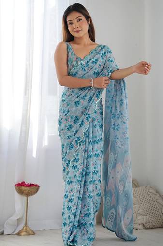 sky blue chinon silk blend print work with mirror work border designer saree