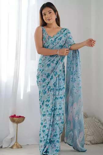 sky blue chinon silk blend print work with mirror work border designer saree