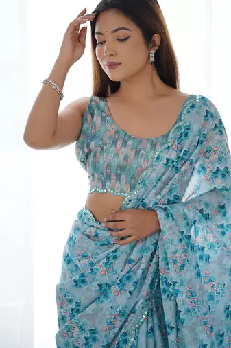 sky blue chinon silk blend print work with mirror work border designer saree