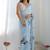 sky blue chinon silk blend print work with mirror work border designer saree