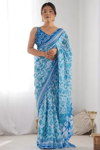 sky blue chinon silk blend print work with mirror work border designer saree